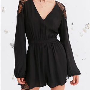 NWT Long Sleeve Black Romper with Lace